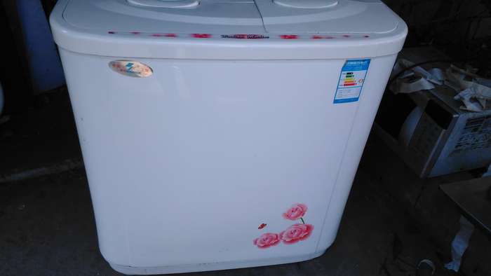 双桶洗衣机一般采用两个机械发条式定时器