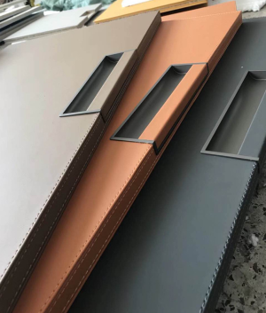 哪家有皮革的柜门定制啊想要超纤皮的那种周围走一圈车缝线那种感觉